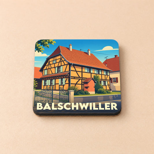 Dessous de verre souvenir de la ville de Balschwiller avec une illustration stylisée d'une maison à colombages.
