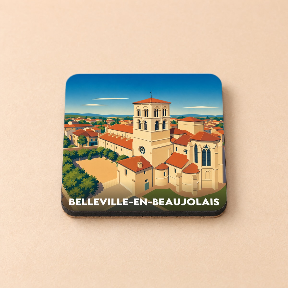 Dessous de verre souvenir de la ville de Belleville-en-Beaujolais avec une illustration stylisée de son église.