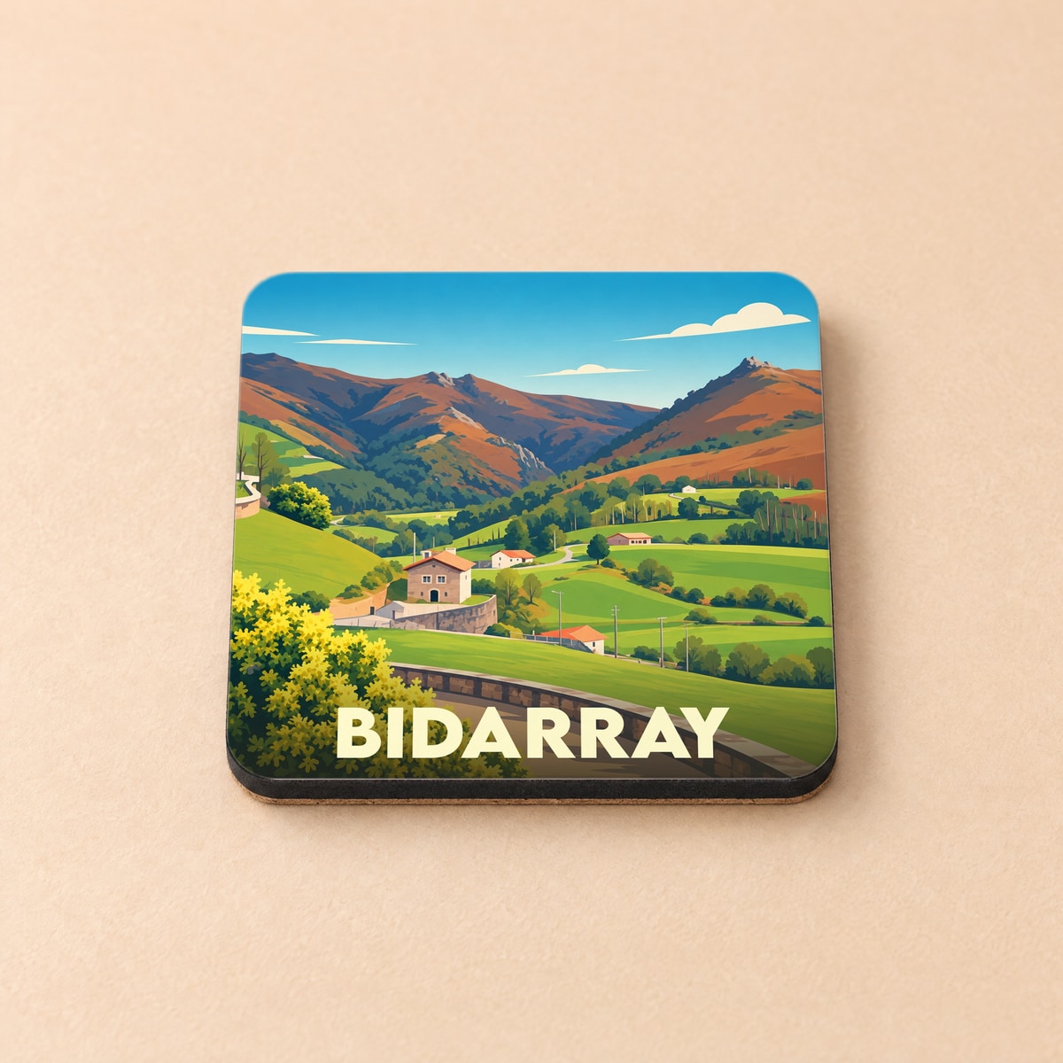 Dessous de verre souvenir de Bidarray avec une illustration stylisée de son paysage montagneux.
