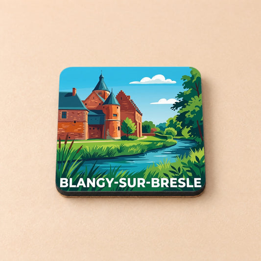 Dessous de verre souvenir de la ville de Blangy-sur-Bresle avec une illustration stylisée d'un château au bord de l'eau.