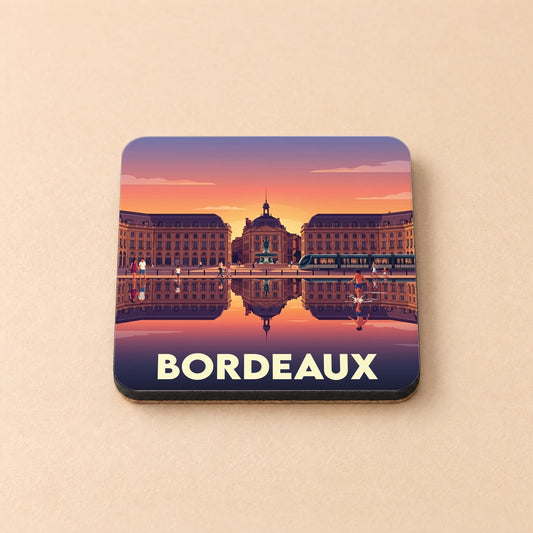 Dessous de verre souvenir de la ville de Bordeaux avec une illustration stylisée de la place de la Bourse.
