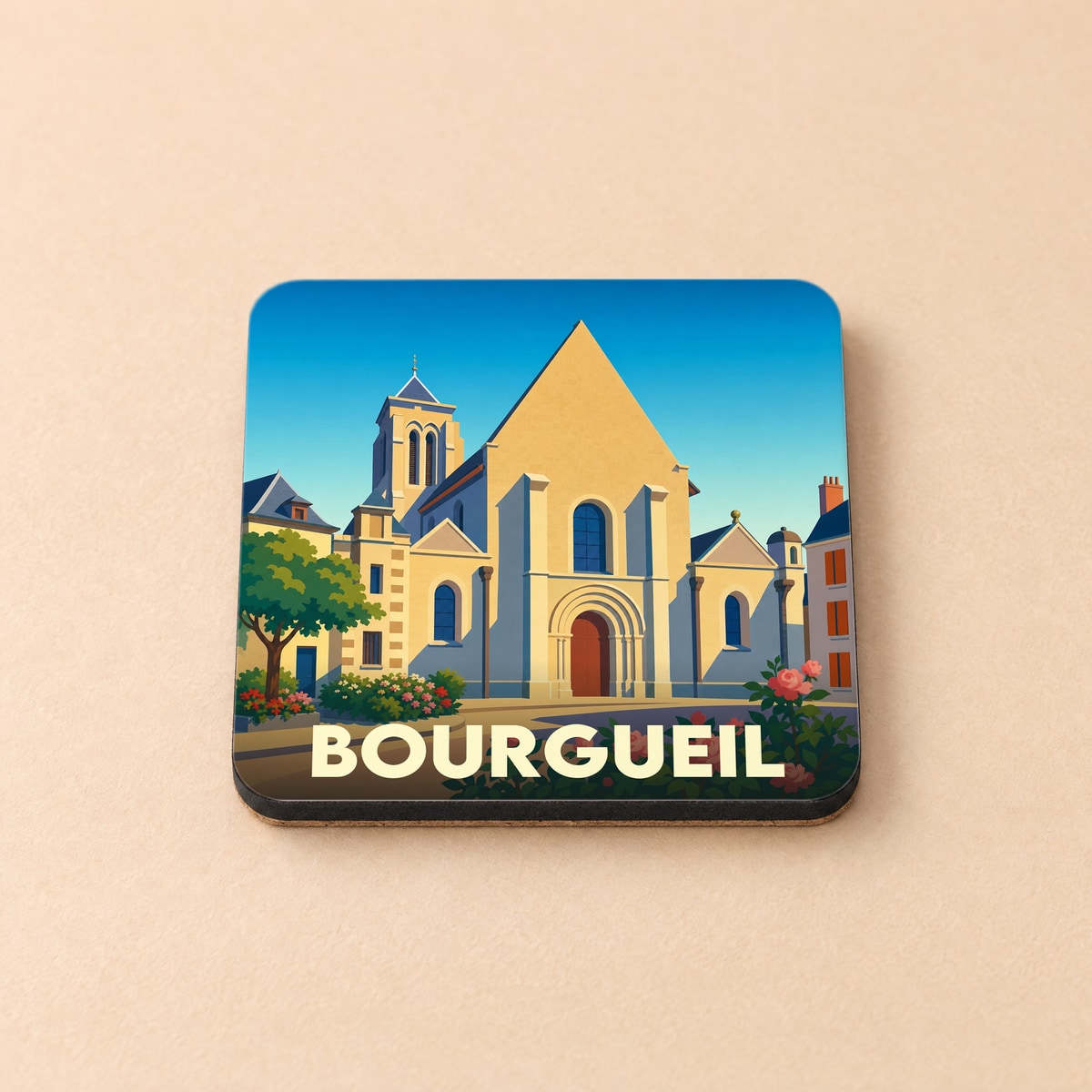 Dessous de verre souvenir de la ville de Bourgueil avec une illustration stylisée de son église.