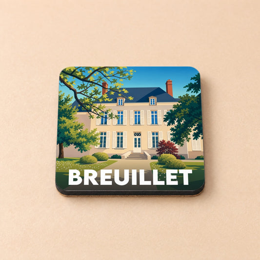 Dessous de verre souvenir de la ville de Breuillet avec une illustration stylisée d'une demeure bourgeoise.