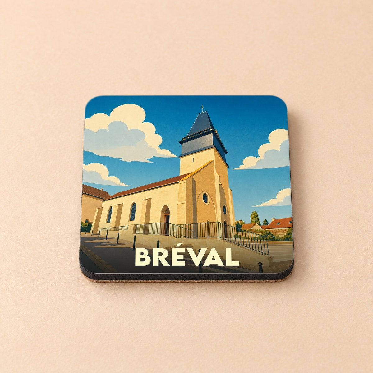 Dessous de verre souvenir de la ville de Bréval avec une illustration stylisée de son église.