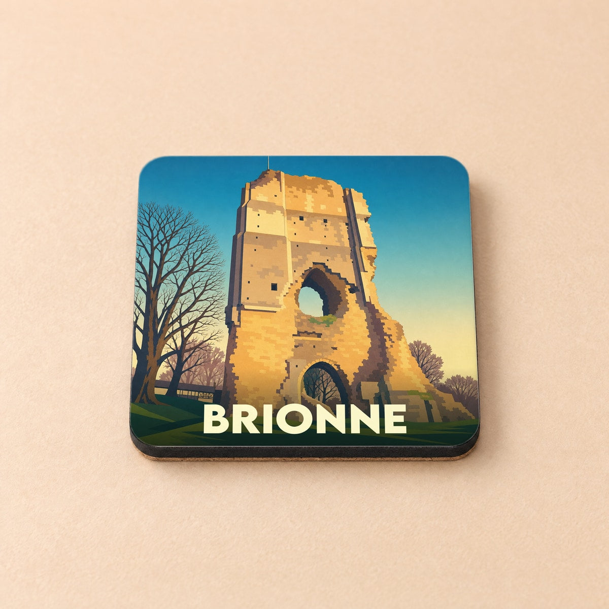 Dessous de verre souvenir de la ville de Brionne avec une illustration stylisée de son donjon médiéval.
