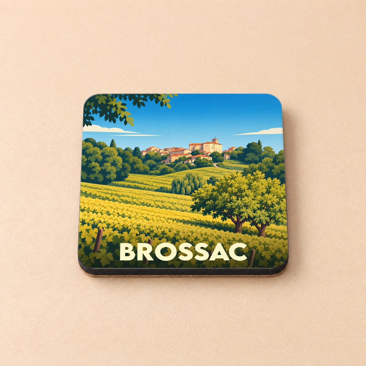Dessous de verre souvenir de la ville de Brossac avec une illustration stylisée de paysages vallonnés et de vignobles.