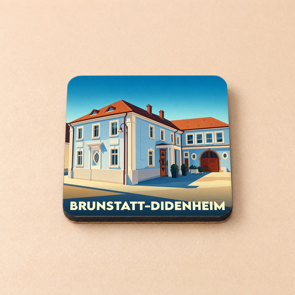 Dessous de verre souvenir de Brunstatt-Didenheim avec une illustration stylisée de l'architecture locale.