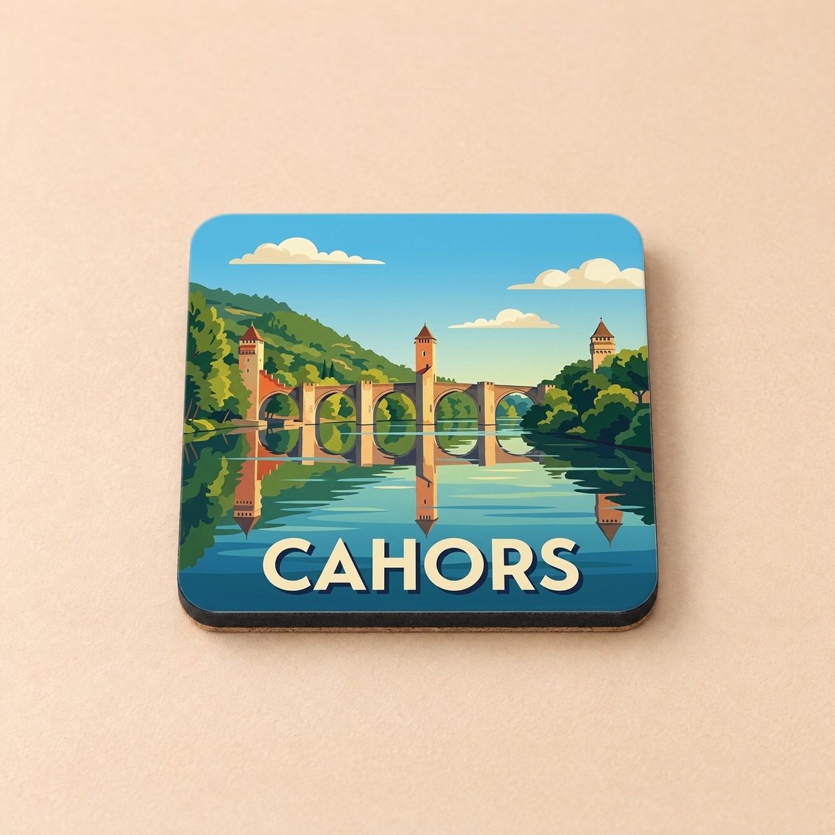 Dessous de verre souvenir de la ville de Cahors illustrant le célèbre pont Valentré dans un style vintage.