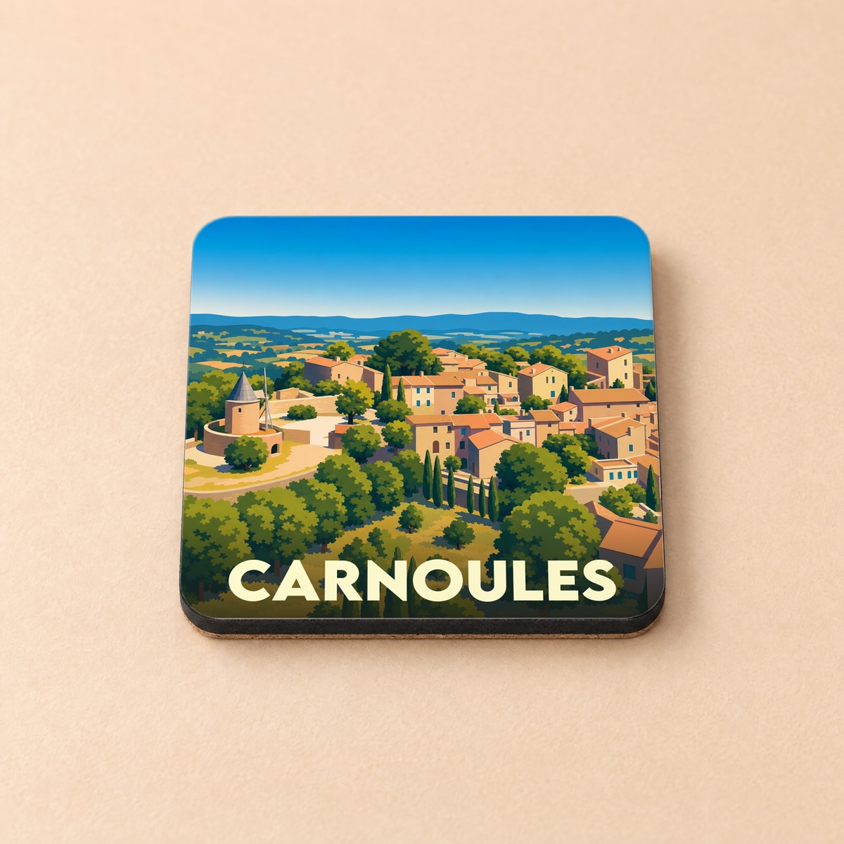 Dessous de verre souvenir de la ville de Carnoules avec une illustration stylisée de ses paysages provençaux.
