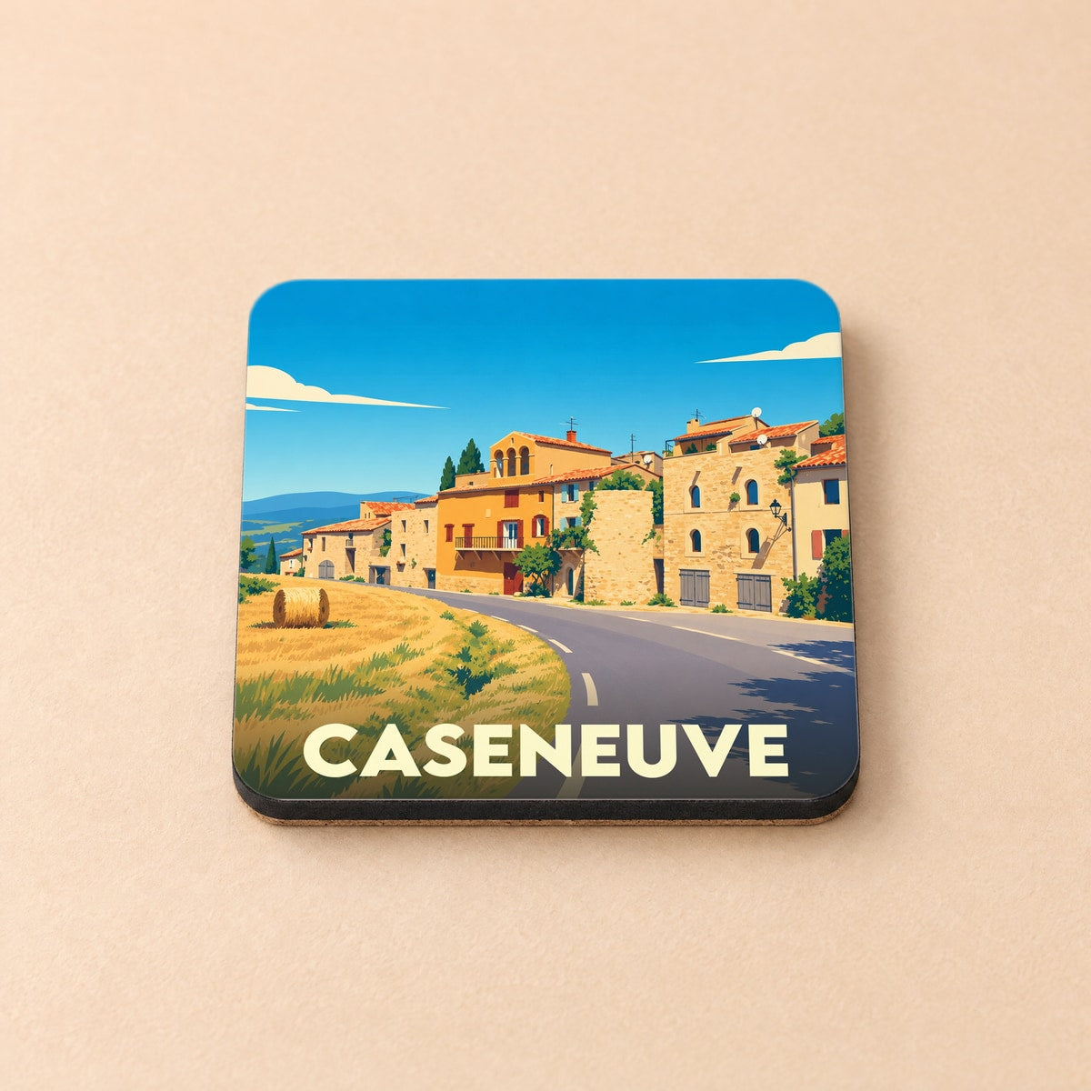 Dessous de verre souvenir de la ville de Caseneuve avec une illustration stylisée d'un village provençal.