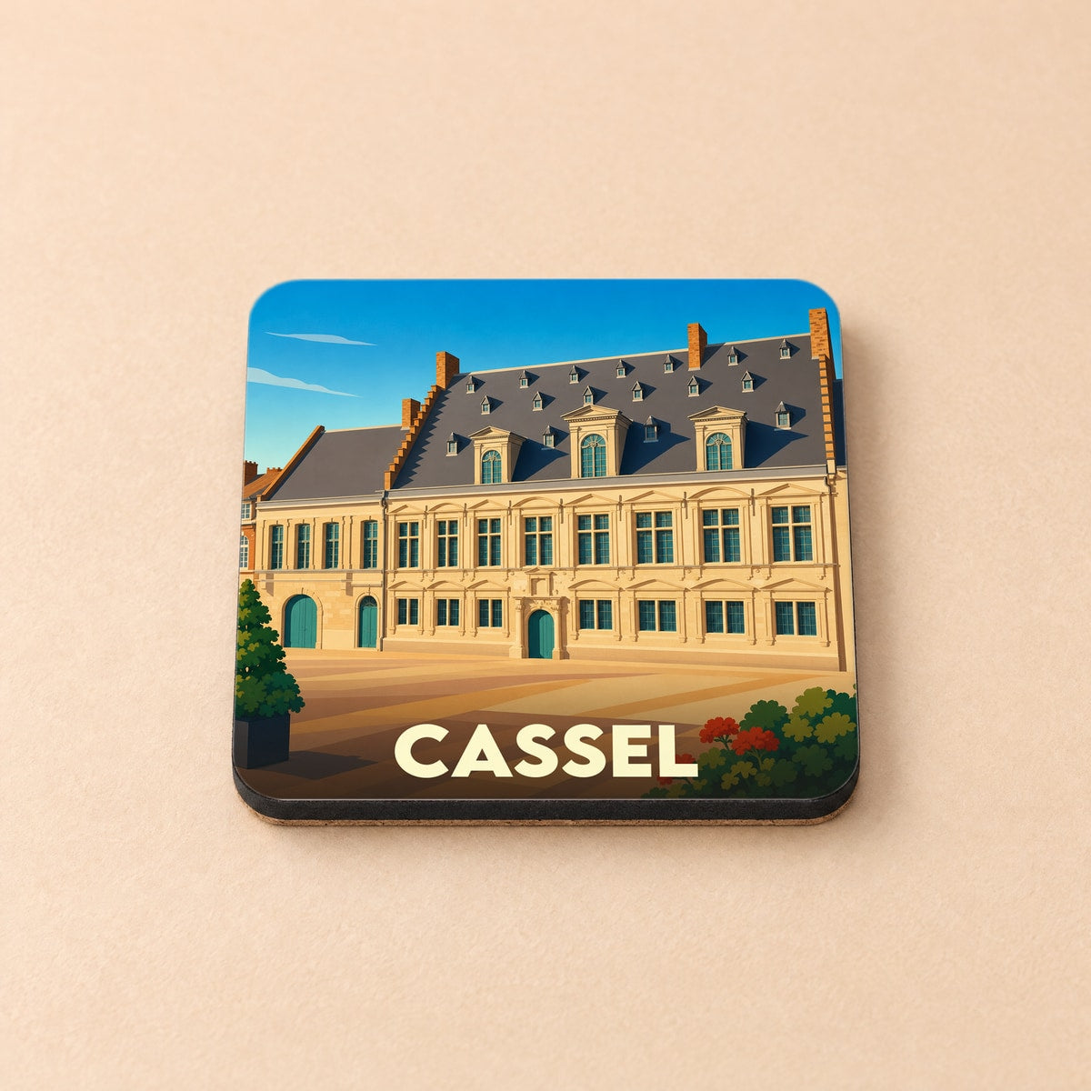 Dessous de verre souvenir de la ville de Cassel avec une illustration stylisée de l'Hôtel de la Noble Cour.