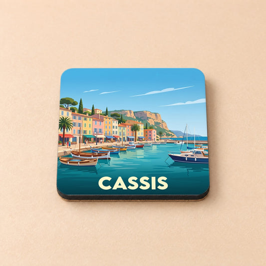 Dessous de verre souvenir de la ville de Cassis avec une illustration stylisée de son port.
