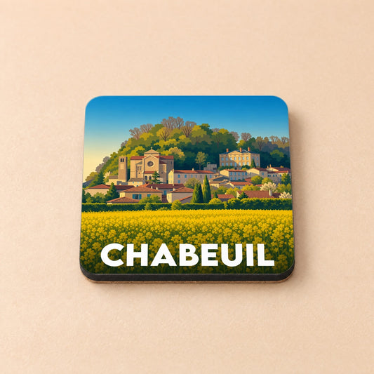 Dessous de verre souvenir de la ville de Chabeuil avec une illustration stylisée d'un paysage de campagne française.