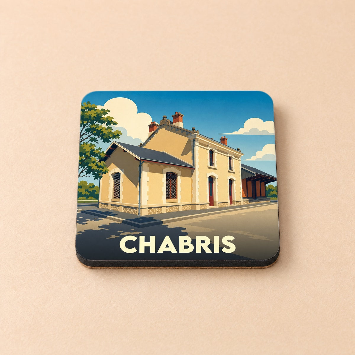 Dessous de verre souvenir de la ville de Chabris illustré par un dessin stylisé de son ancienne gare.