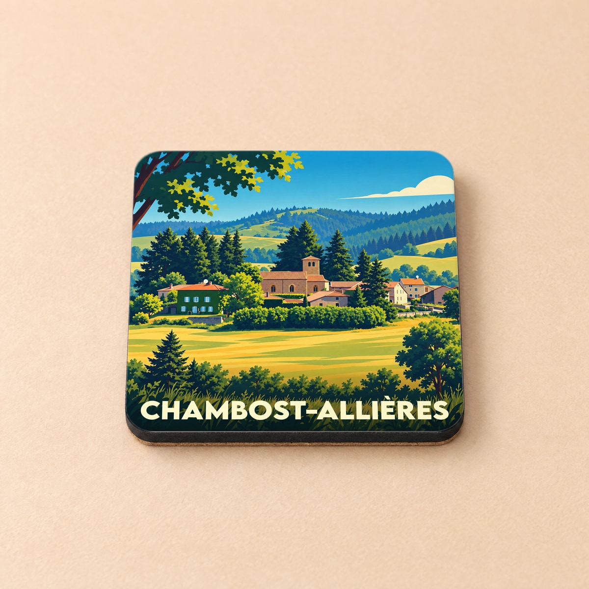 Dessous de verre souvenir de la ville de Chambost-Allières avec une illustration paysagère stylisée.