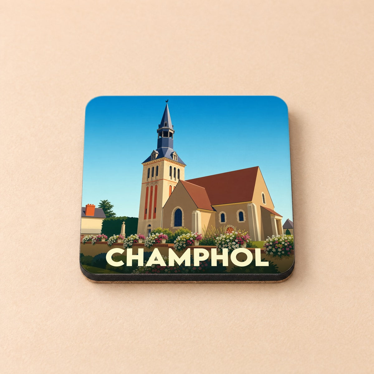 Dessous de verre souvenir de la ville de Champhol avec une illustration stylisée de son église.