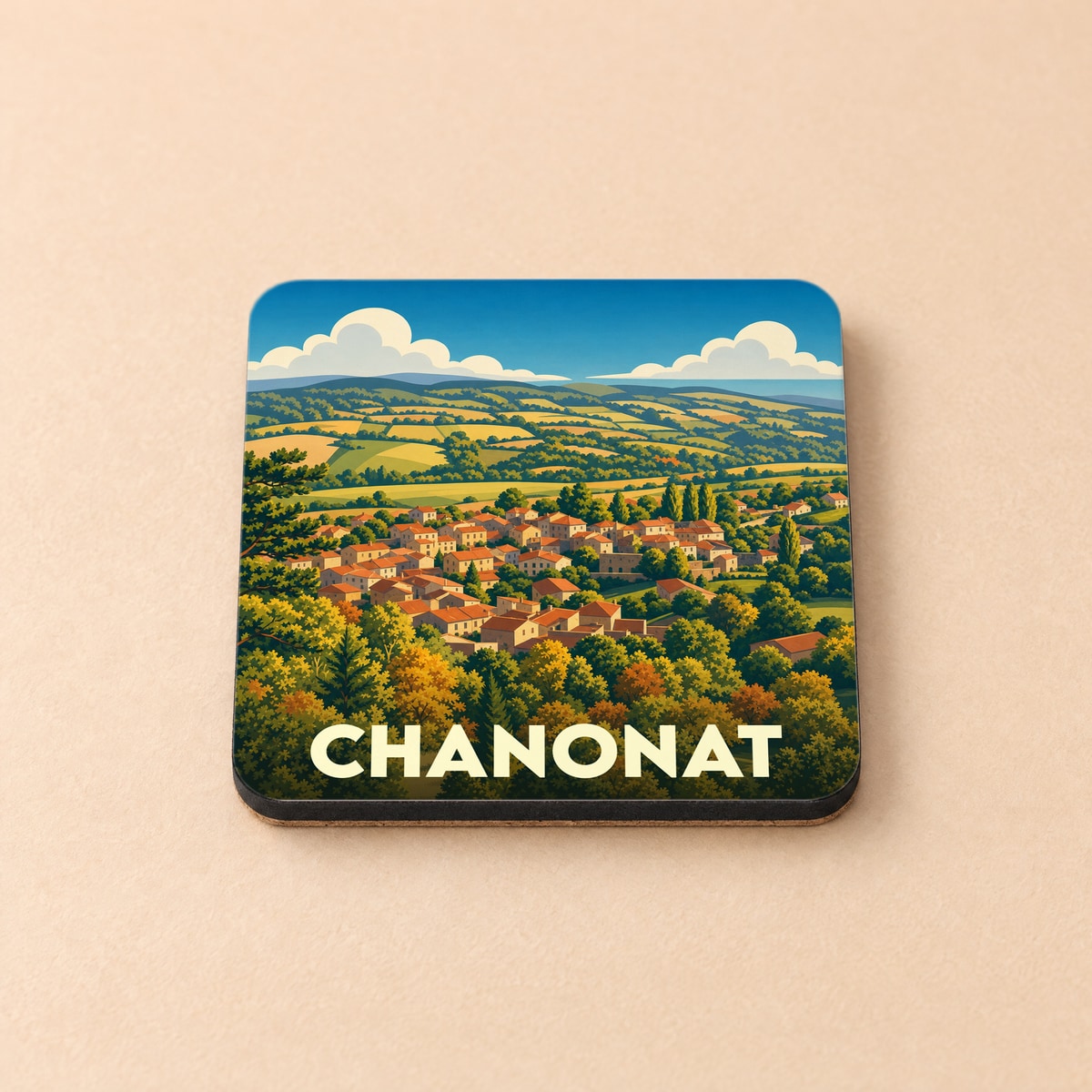 Dessous de verre souvenir de la ville de Chanonat avec une illustration stylisée de son paysage vallonné.