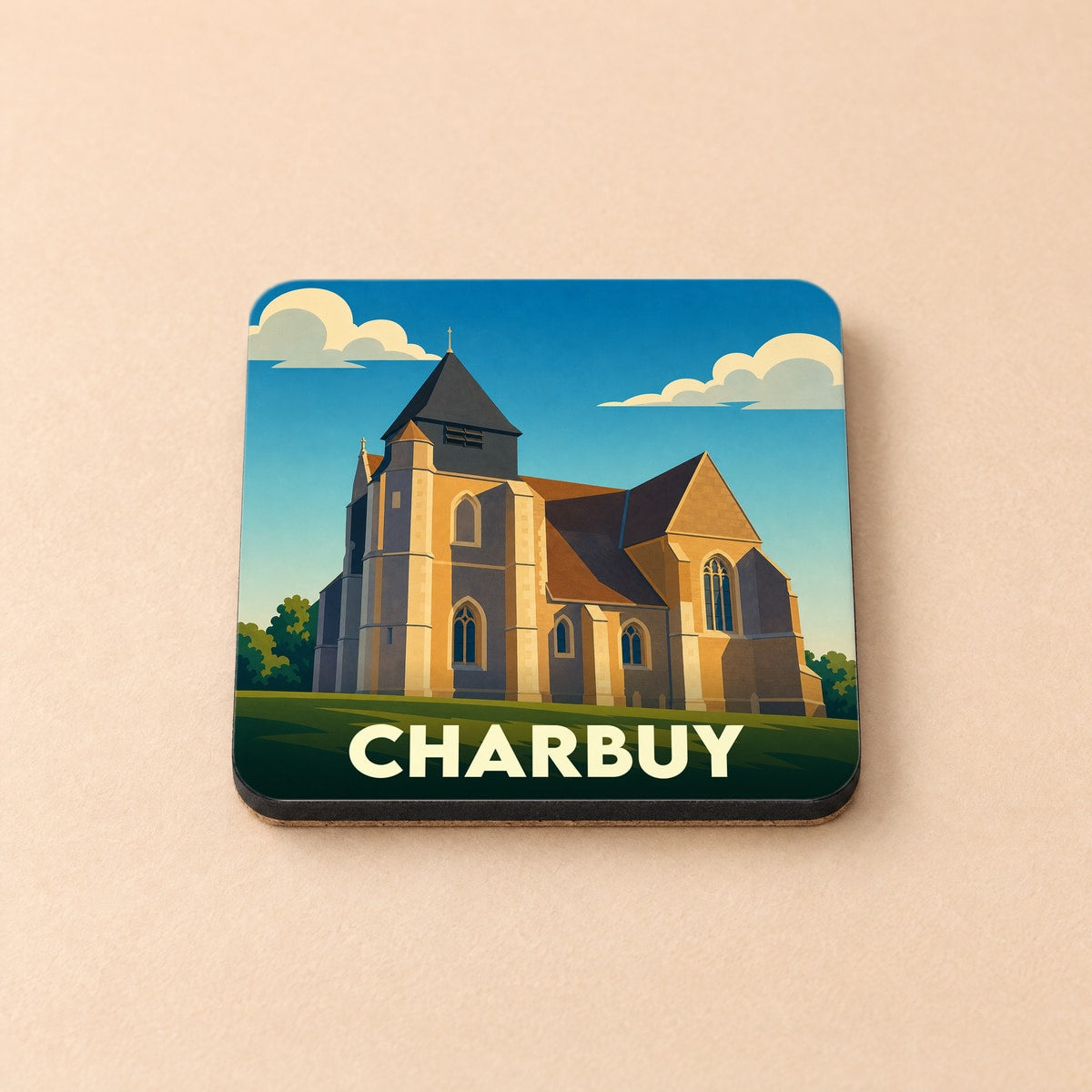 Dessous de verre souvenir de la ville de Charbuy avec une illustration stylisée de son église.