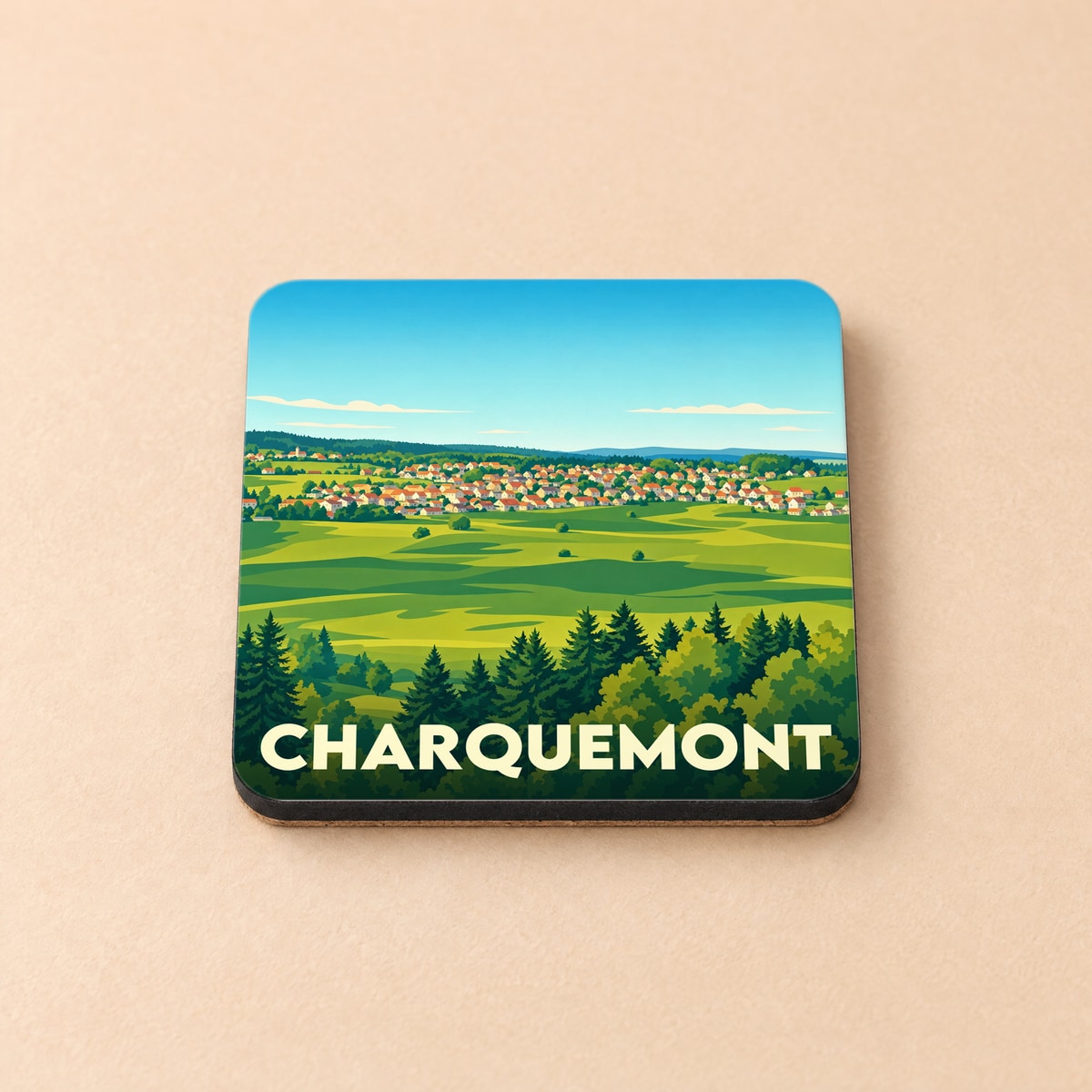 Dessous de verre souvenir de la ville de Charquemont avec une illustration stylisée d'un paysage de campagne.