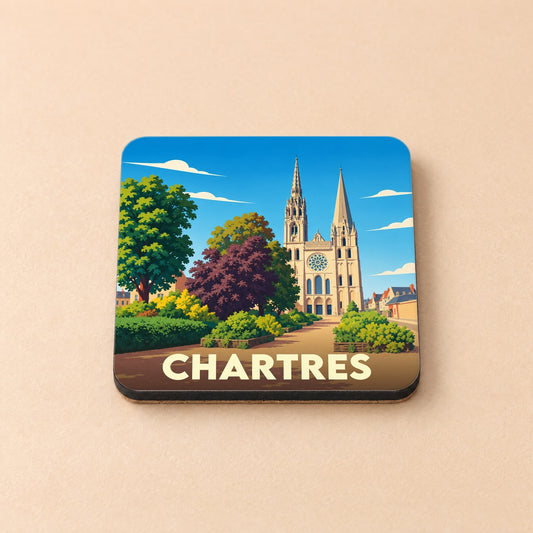 Dessous de verre souvenir de la ville de Chartres avec une illustration stylisée de sa cathédrale.