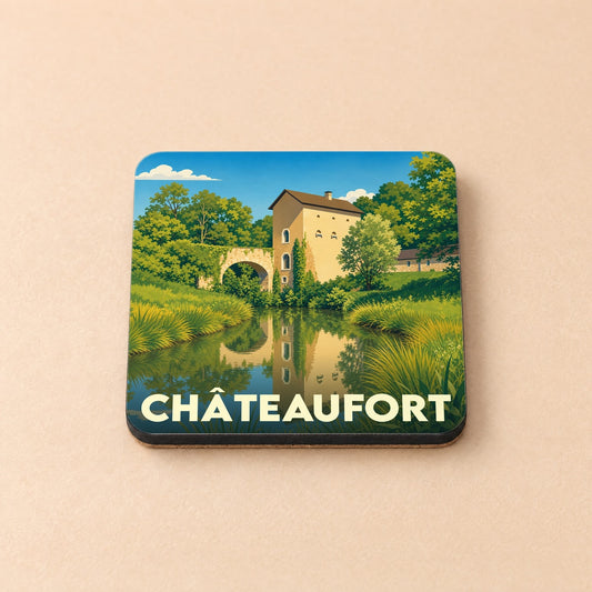 Dessous de verre souvenir de la ville de Châteaufort avec une illustration stylisée.
