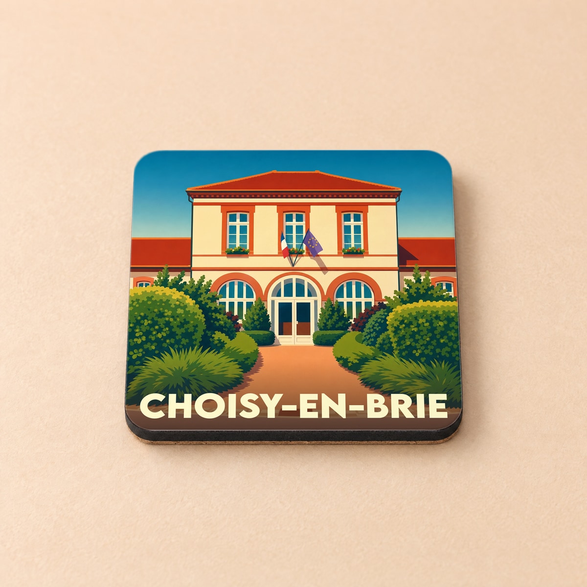 Dessous de verre souvenir de la ville de Choisy-en-Brie avec une illustration stylisée de sa mairie.