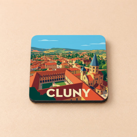 Dessous de verre souvenir de la ville de Cluny avec une illustration stylisée de son abbaye et de ses paysages.