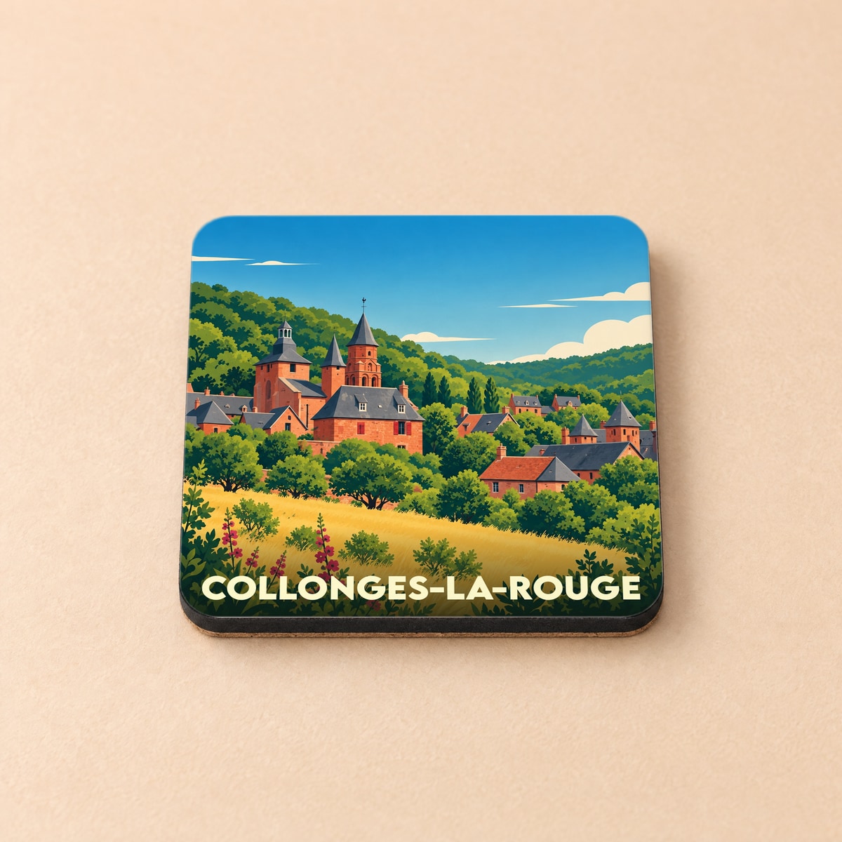 Dessous de verre souvenir de la ville de Collonges-la-Rouge avec une illustration stylisée de ses maisons en grès rouge.