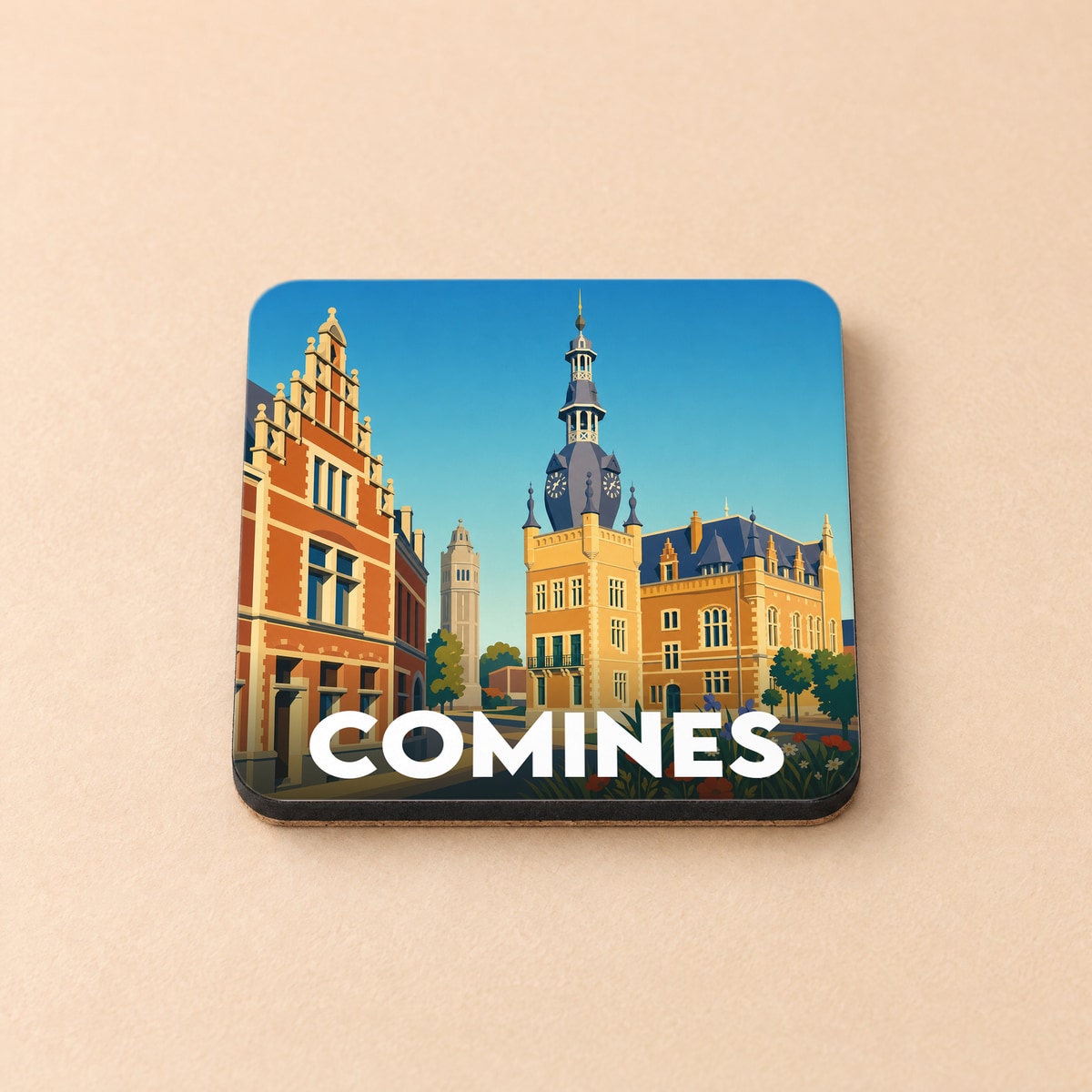Dessous de verre souvenir de la ville de Comines avec une illustration stylisée de son architecture emblématique.