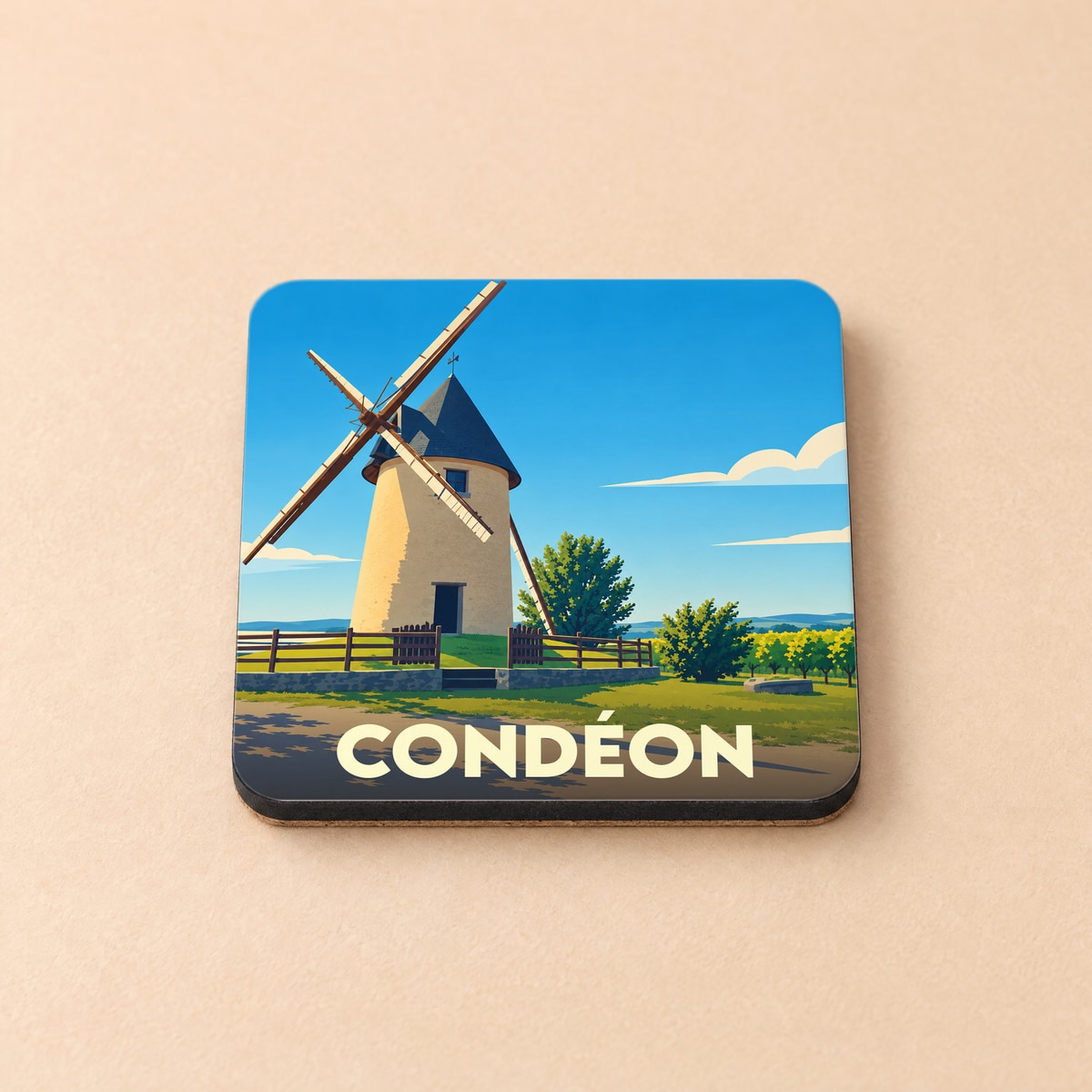 Dessous de verre souvenir de la ville de Condéon avec une illustration stylisée d'un moulin à vent.