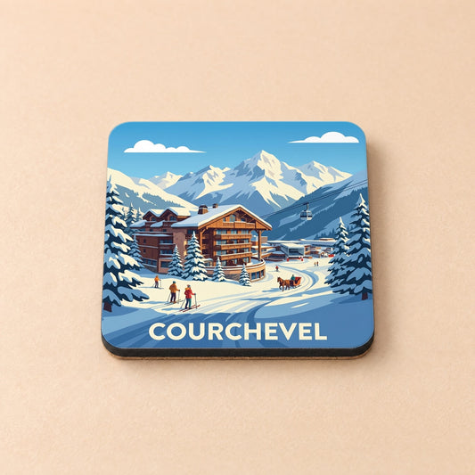 Dessous de verre souvenir de la ville de Courchevel illustrant une station de ski enneigée.
