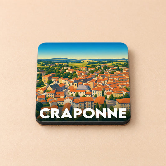 Dessous de verre souvenir de la ville de Craponne avec une illustration stylisée de ses toits orangés et de ses paysages vallonnés.