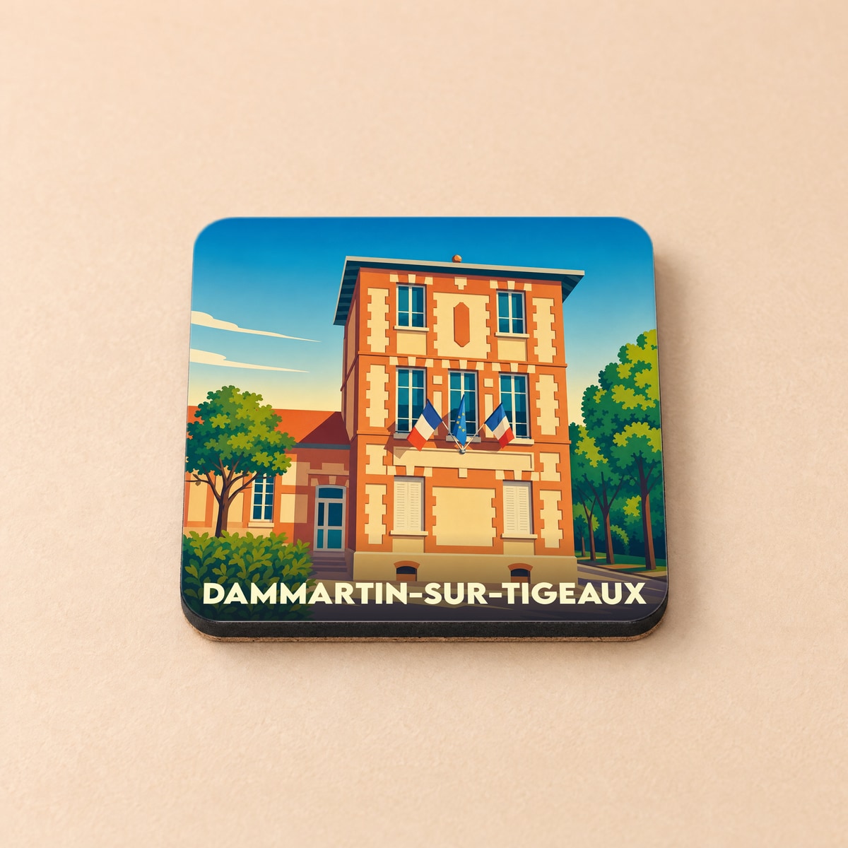 Dessous de verre souvenir de la ville de Dammartin-sur-Tigeaux avec une illustration stylisée de la mairie.
