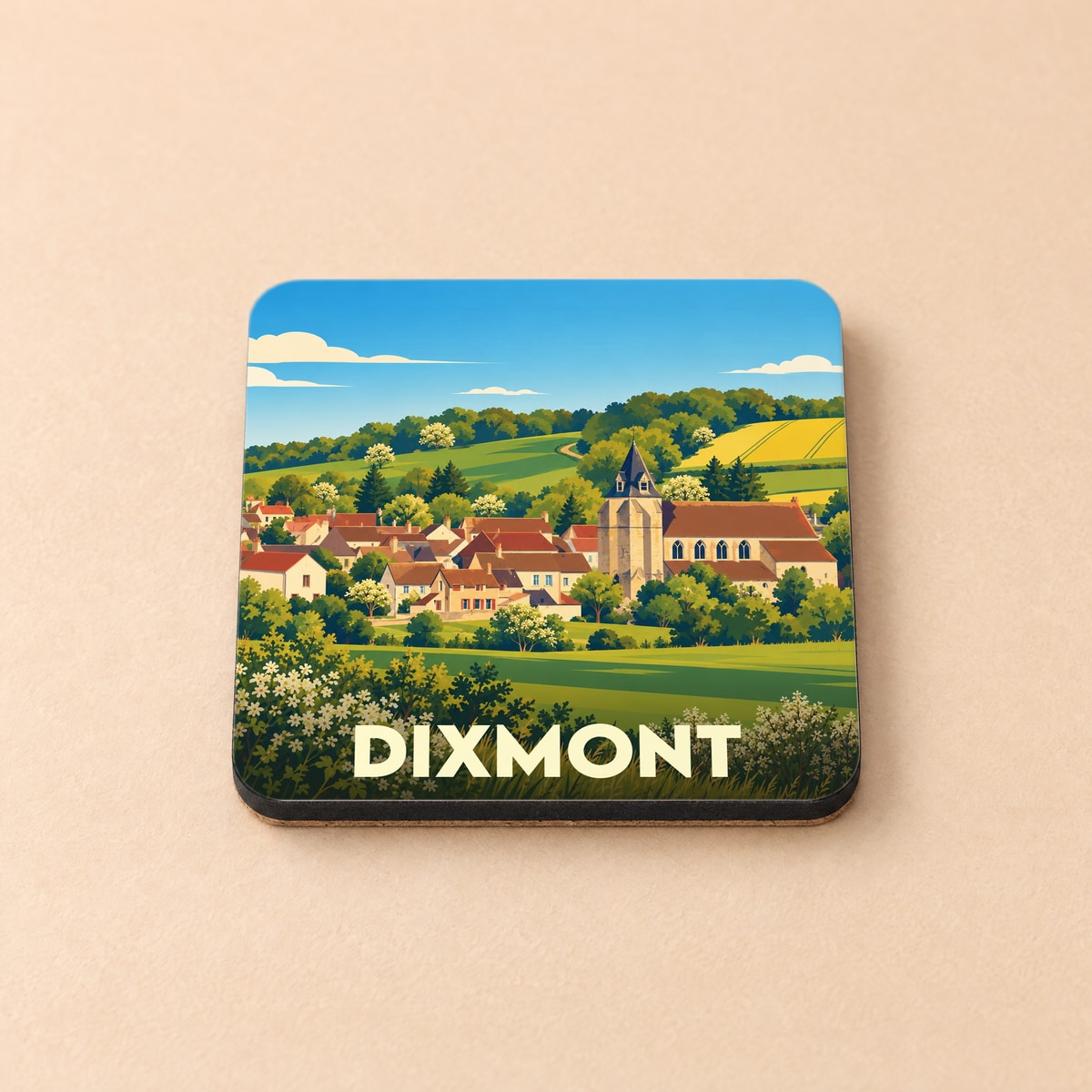 Dessous de verre souvenir de la ville de Dixmont avec une illustration stylisée d'un paysage de campagne.