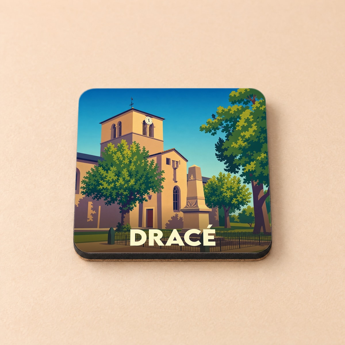 Dessous de verre souvenir de la ville de Dracé avec une illustration stylisée d'une église et d'un monument.