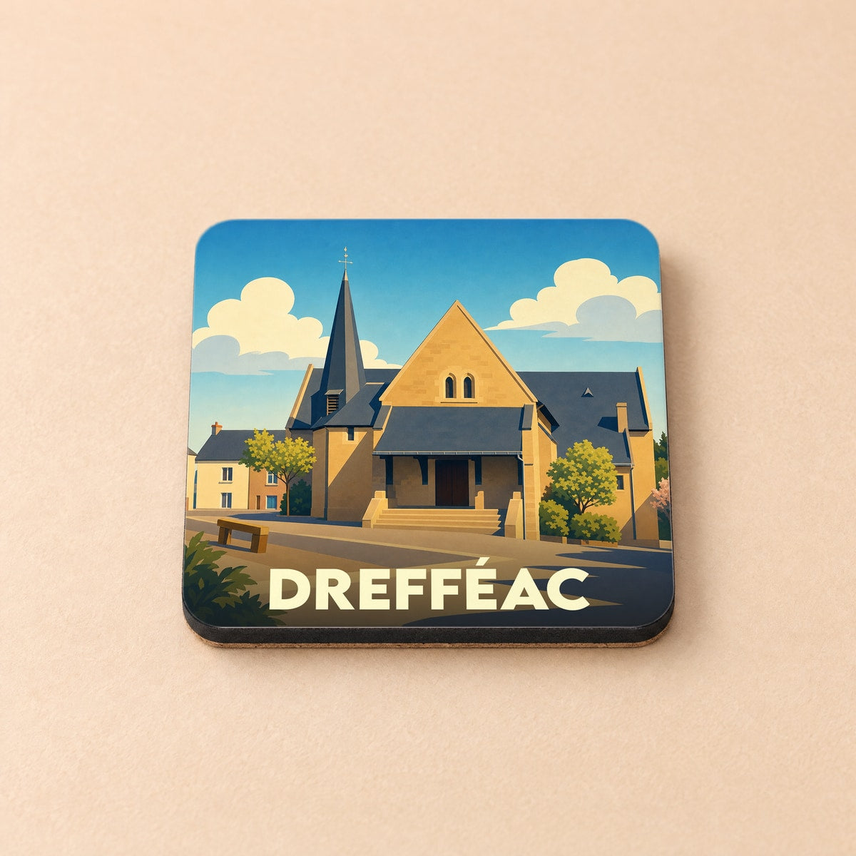 Dessous de verre souvenir de la ville de Drefféac avec une illustration stylisée de son église.