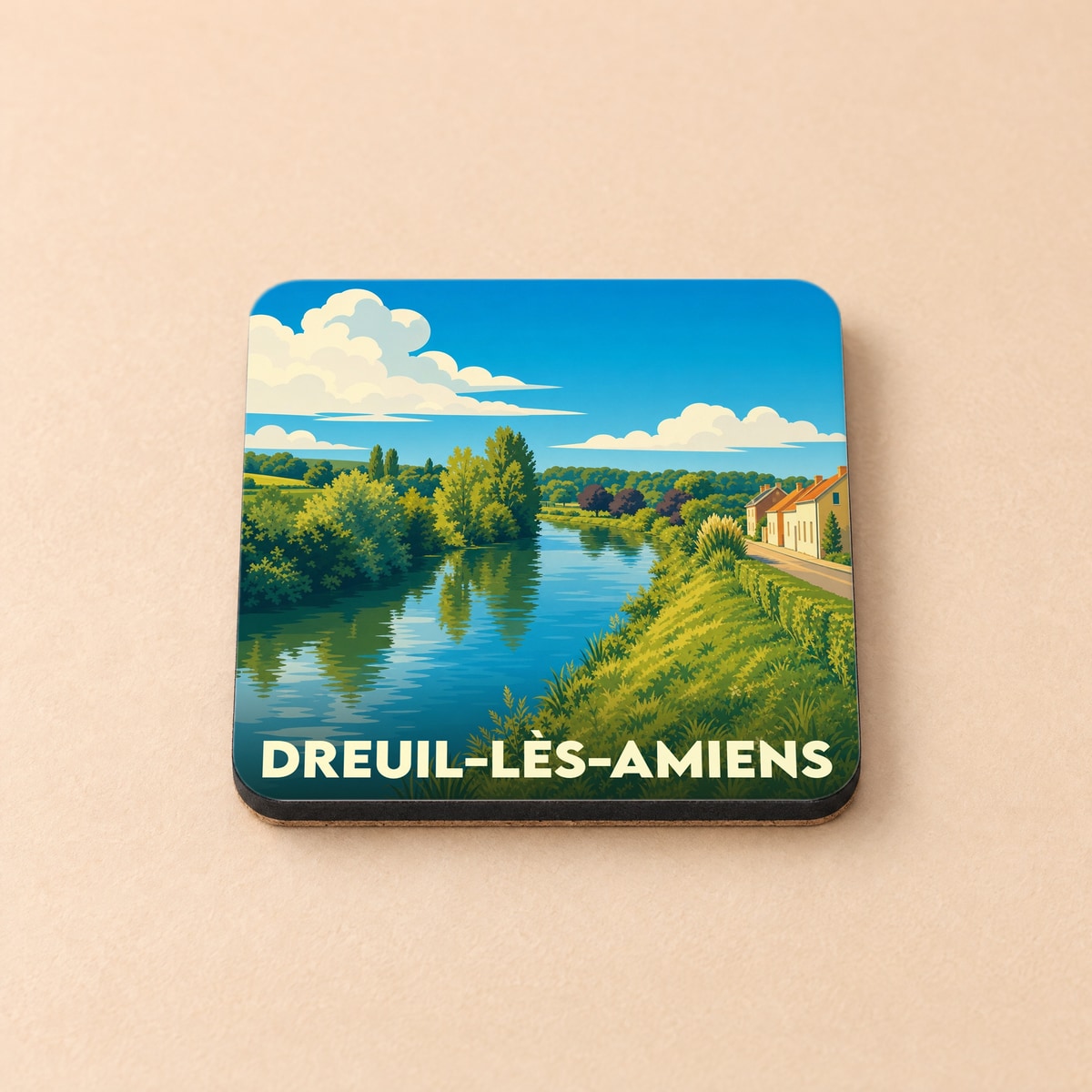 Dessous de verre souvenir de la ville de Dreuil-lès-Amiens avec une illustration paysagère stylisée.