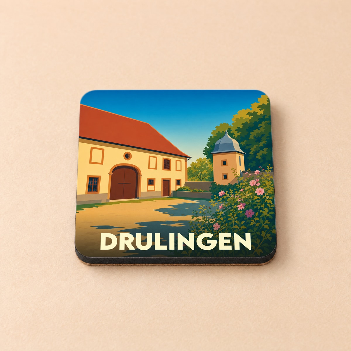 Dessous de verre souvenir de la ville de Drulingen avec une illustration stylisée d'un bâtiment historique.
