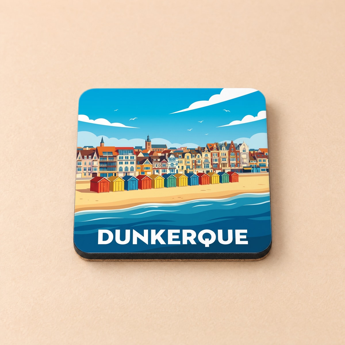 Dessous de verre souvenir de la ville de Dunkerque avec une illustration stylisée de son front de mer et de ses cabines de plage colorées.