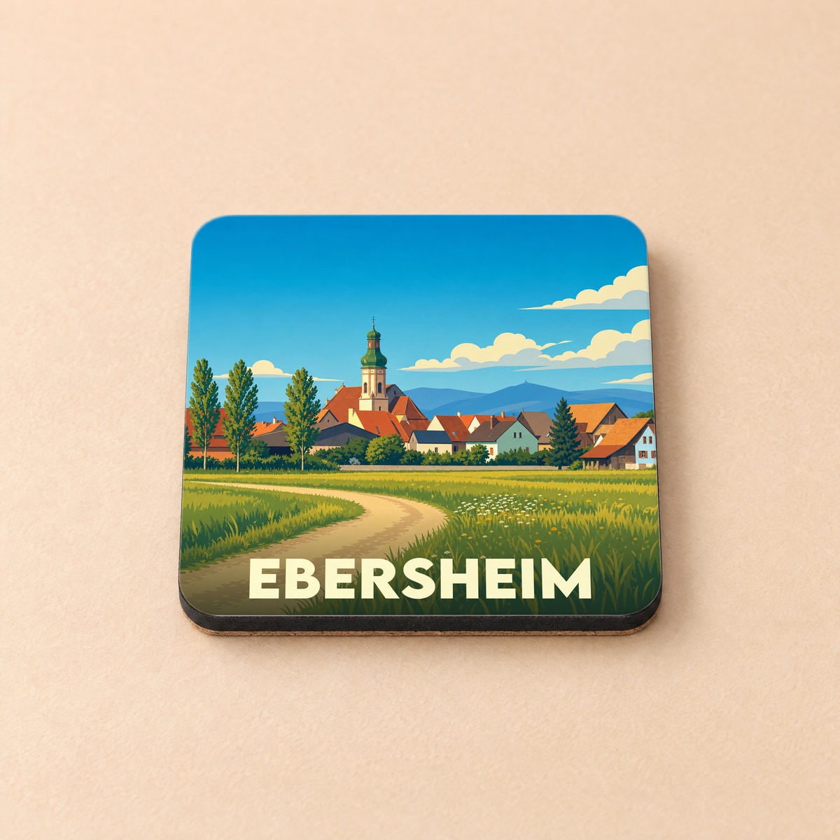 Dessous de verre souvenir de la ville d'Ebersheim avec une illustration stylisée d'un village alsacien.
