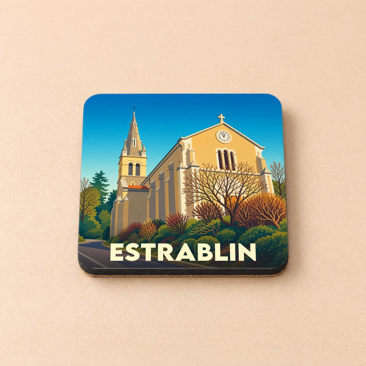 Dessous de verre souvenir de la ville d'Estrablin avec une illustration stylisée de son église.