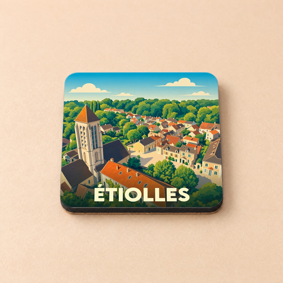 Dessous de verre souvenir de la ville de Étiolles avec une illustration stylisée de son église et de ses toits.
