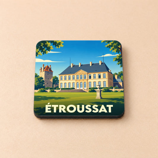 Dessous de verre souvenir de la ville d’Étroussat avec une illustration stylisée d'un château.