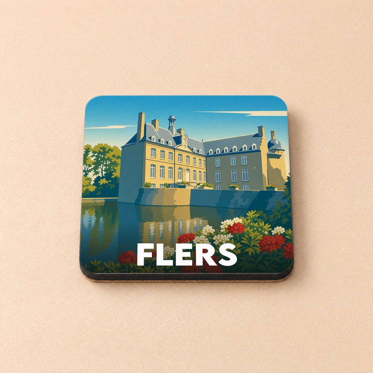 Dessous de verre souvenir de la ville de Flers illustrant son château au bord de l'eau.