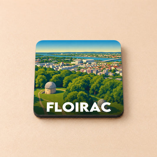 Dessous de verre souvenir de la ville de Floirac avec une illustration stylisée de son observatoire et du panorama urbain.