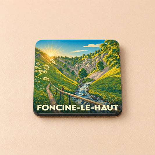 Dessous de verre souvenir de Foncine-le-Haut illustré d'un paysage montagneux stylisé au lever du soleil.