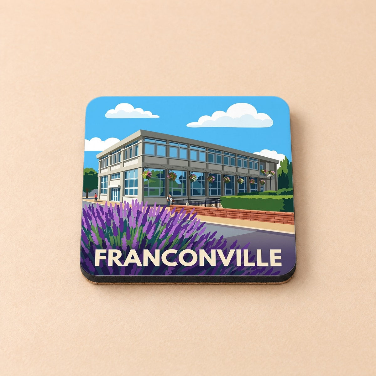 Dessous de verre souvenir de la ville de Franconville avec une illustration stylisée et colorée.