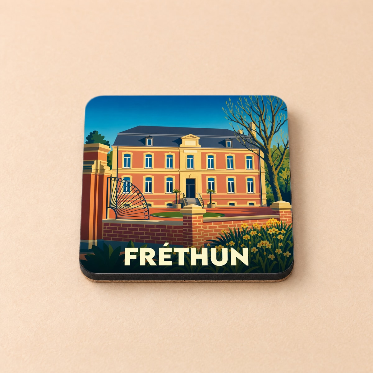 Dessous de verre souvenir de la ville de Fréthun avec une illustration stylisée d'un bâtiment historique.