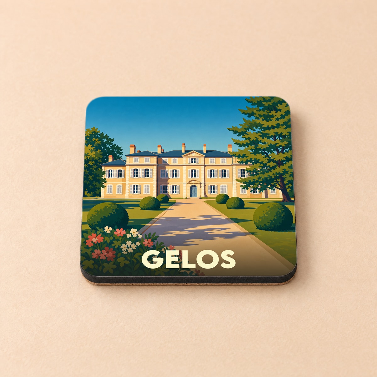 Dessous de verre souvenir de la ville de Gelos avec une illustration stylisée d'un château.