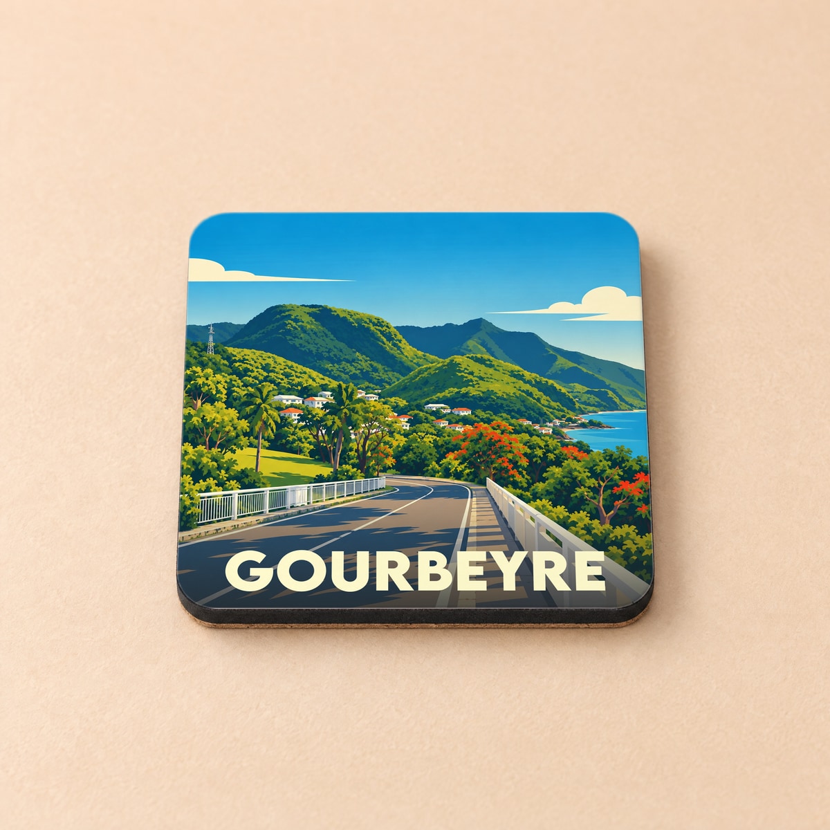 Dessous de verre souvenir de la ville de Gourbeyre avec une illustration stylisée de son paysage montagneux et côtier.
